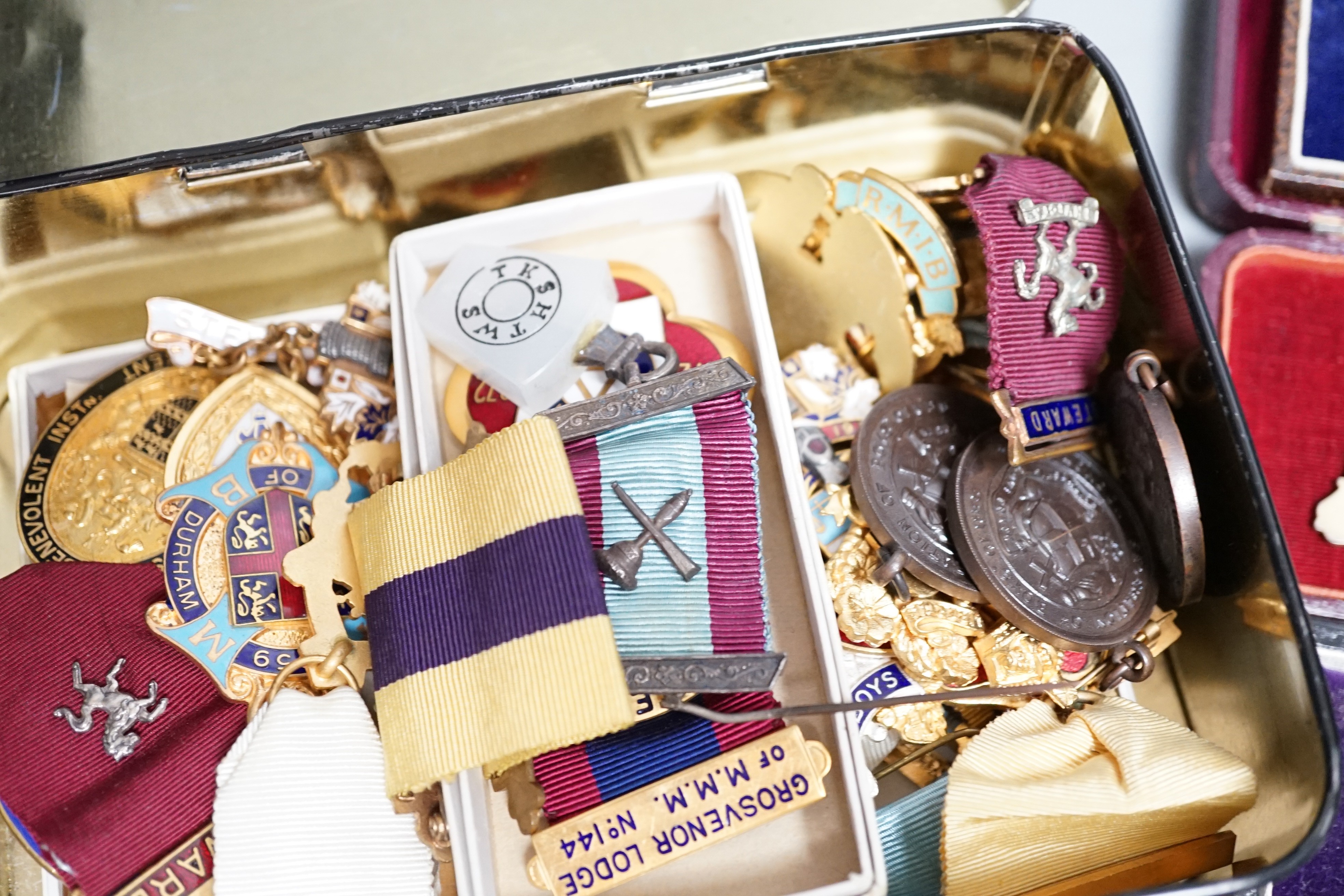 A collection of silver or gilt metal and enamel Masonic medals